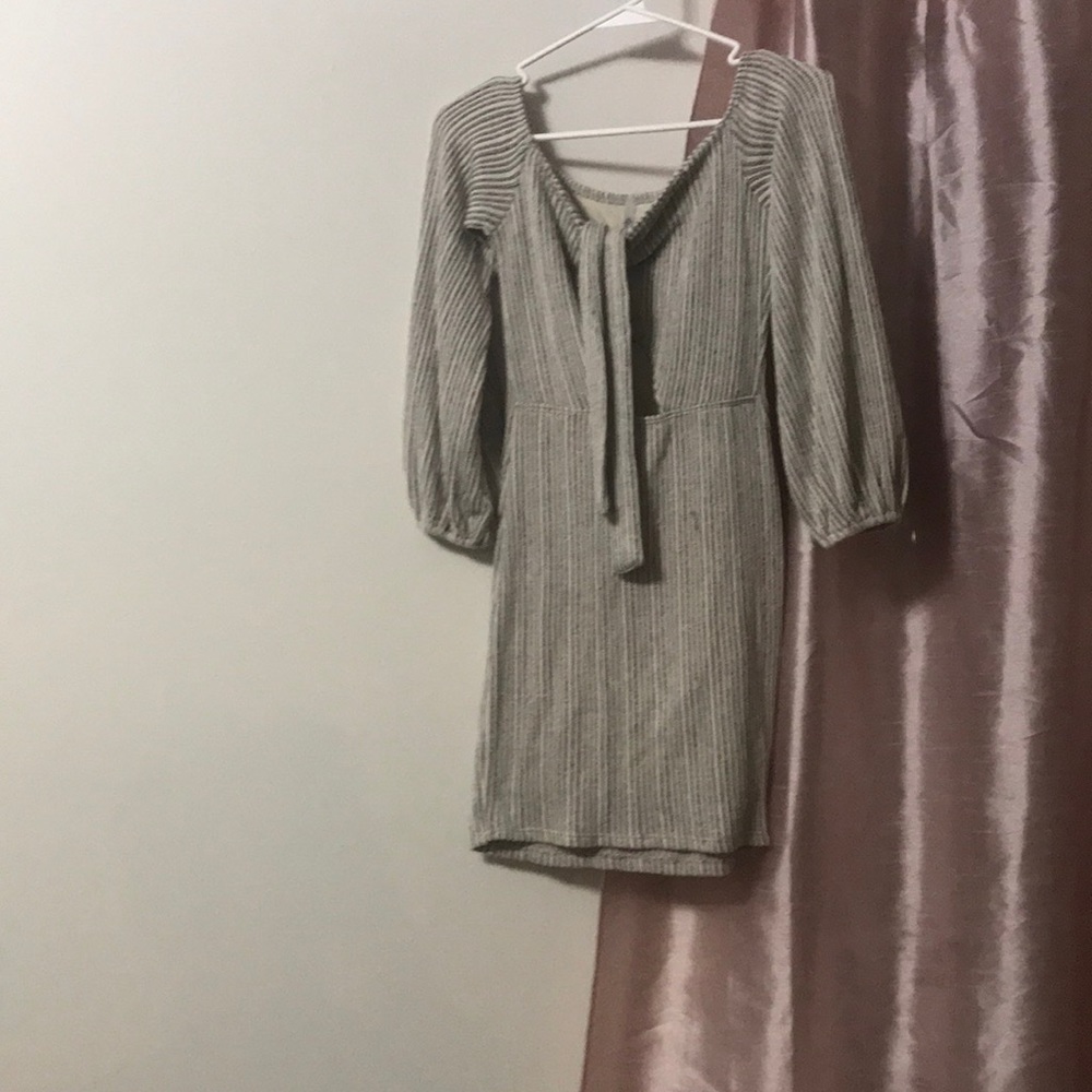 Medium open stomach dress above the knees